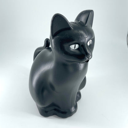 Chat arrosoir