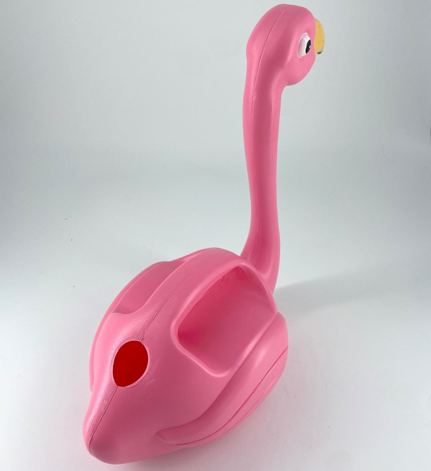 Flamant rose arrosoir